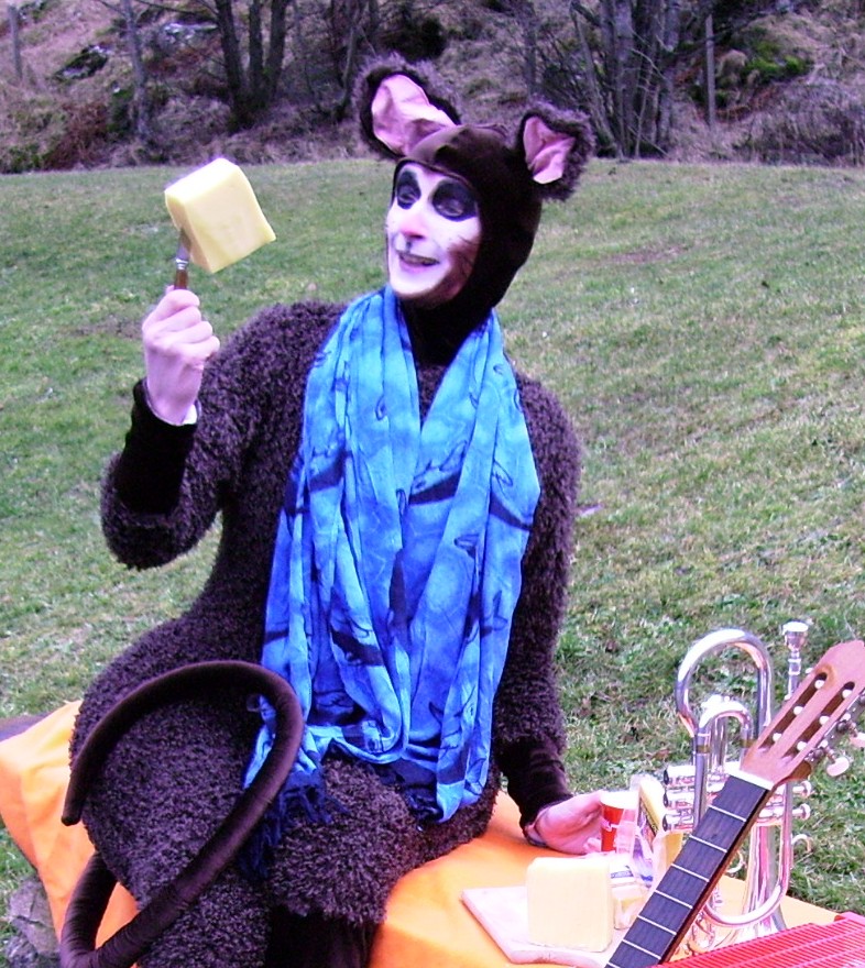 Mouse enjoys some cheese
